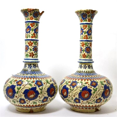 Lot 262 - A pair of Continental slipware bottle vases, late 19th century, possibly Thoune, painted in...