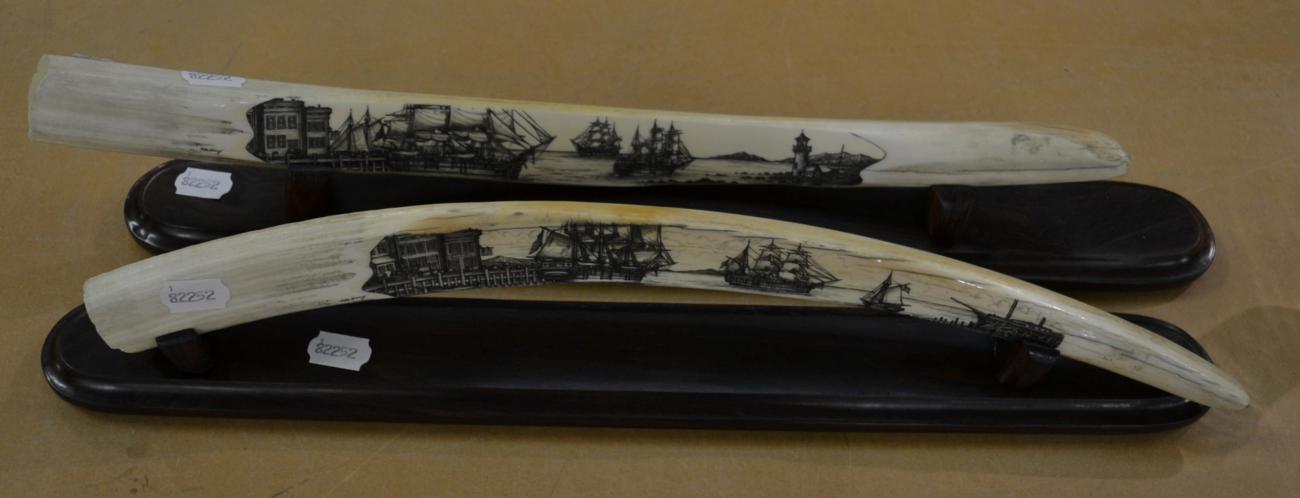 Lot 761 - A pair of modern scrimshaw carved walrus tusks, by Peter Kinney, decorated with sailing ships...