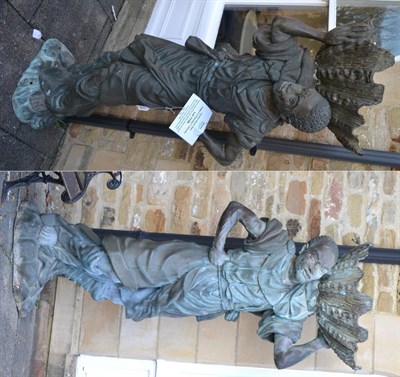 Lot 1158 - A well patinated pair of life size bronze garden figures modelled as Venetian blackamoors...