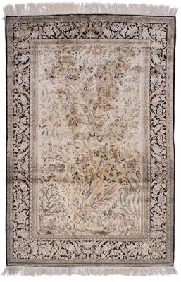 Lot 1186 - Kashan Silk Rug, Central Iran, The ivory field with central tree of life surrounded by birds...
