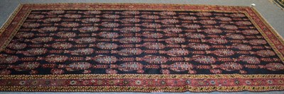 Lot 1188 - A Hamadan Khelleh, Iranian Kurdistan, the charcoal field with columns of boteh enclosed by...