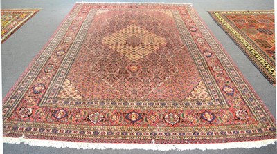 Lot 1192 - Tabriz design carpet the Herati field centred by an ivory medallion framed by spandrels and samovar