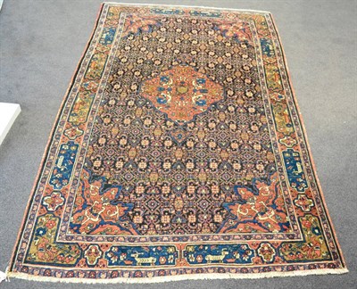 Lot 1199 - Bidjar rug, Iranian Kurdistan, the indigo Herati field around a madder medallion framed by...