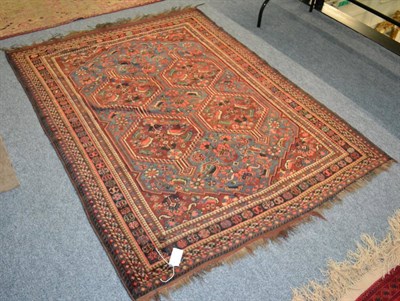 Lot 1203 - Khamseh rug, South West Iran, the stepped lattice field framed by spandrels and multiple...
