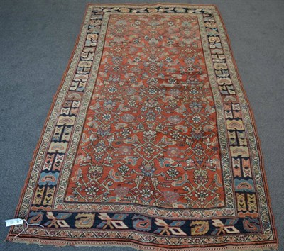 Lot 1204 - Bidajr rug, Iranian Kurdistan, the madder Herati field enclosed by indigo borders of polychrome...