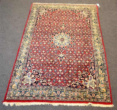 Lot 1207 - Bidjar rug, Iranian Kurdistan, the burgundy Herati field with central anchor medallion framed...