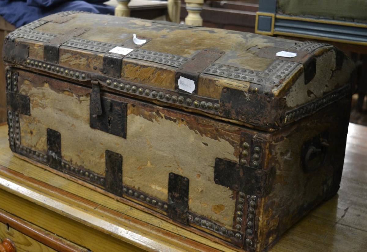 Lot 1652 - A 19th century pony skin metal bound hinged box, brass plaque engraved 'Col. Sir Harry North'  62cm