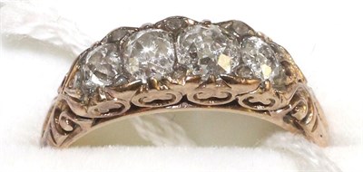 Lot 5 - A diamond ring, four graduated old cut diamonds spaced by rose cut diamond accents, in a yellow...