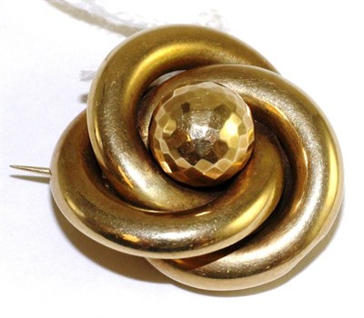 Lot 11 - A Victorian knot brooch, a central faceted sphere within a knot frame, with a glazed locket to...