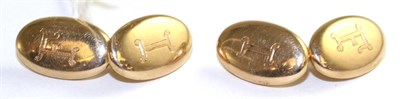 Lot 47 - A pair of 15 carat gold double oval cufflinks, double bar linked, monogrammed