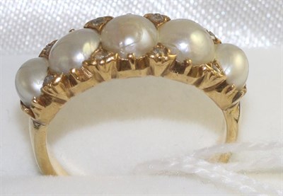Lot 49 - A pearl and diamond ring, five graduated pearls spaced by rose cut diamond accents in a yellow...