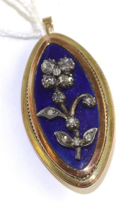Lot 52 - A diamond and blue enamel brooch/pendant, the oval pendant with a central floral motif set with...