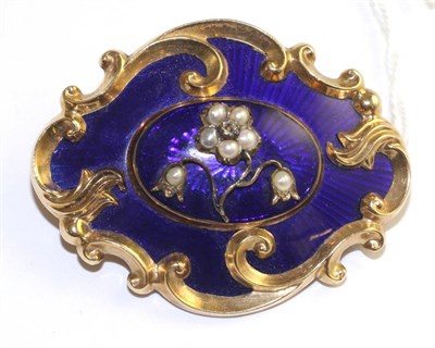 Lot 60 - A blue enamel, split pearl and diamond mourning brooch, the central oval section with a floral...