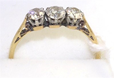 Lot 61 - A diamond three stone ring, graduated round brilliant cut diamonds in white claw settings, to...