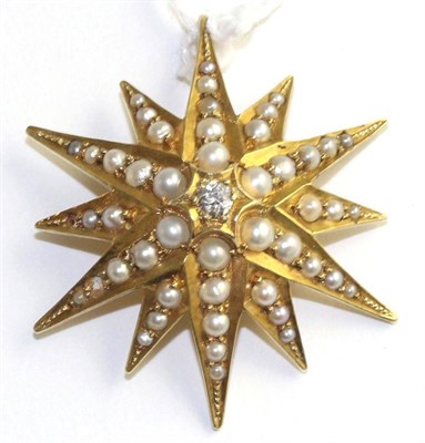 Lot 88 - A Victorian seed pearl and diamond star pendant/brooch, an old cut diamond in a yellow claw setting