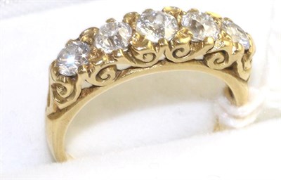 Lot 97 - An 18 carat gold diamond five stone ring, graduated old cut and round brilliant cut diamonds in...