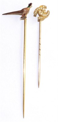 Lot 98 - A pheasant stick pin, realistically modelled with enamelled detail, measures 2cm by 7cm, cased...