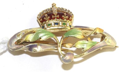 Lot 113 - An Art Nouveau enamel and diamond Royal presentation brooch, an art nouveau foliate motif enamelled