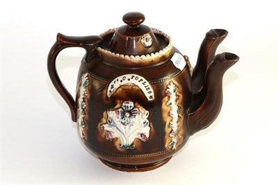 Lot 120 - Measham barge ware double spout teapot and cover, inscribed 'MRS C TOPLISS WHITTINGTON', 20cm high