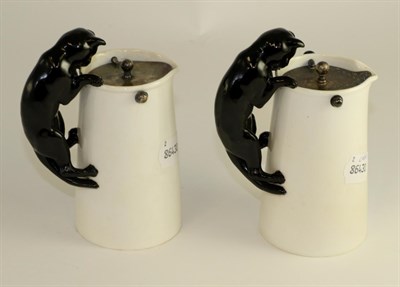 Lot 121 - A matched pair of Copeland china ewers, circa 1921, the handles modelled as cats, one with a silver