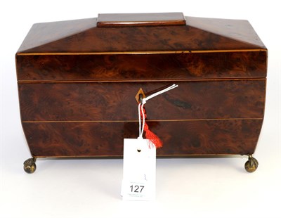 Lot 127 - A Regency yew wood tea caddy, of sarcophagus form containing a glass bowl flanked by lidded...