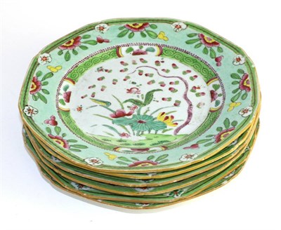Lot 148 - A set of six Chinese porcelain octagonal plates, circa 1800, painted in famille rose enamels...