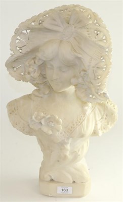 Lot 163 - A Palechi: an alabaster bust of an Art Nouveau maiden, wearing a ribbon tied bonnet and lacy...