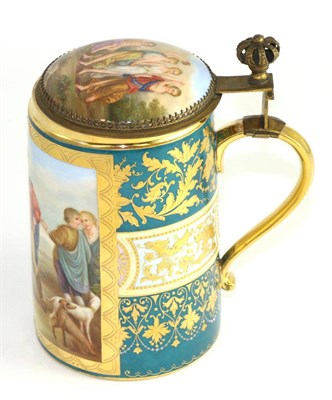 Lot 168 - A gilt metal mounted Vienna style porcelain tankard and cover, circa 1900, decorated with...