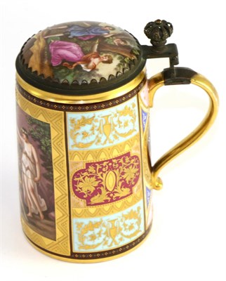 Lot 169 - A metal mounted Vienna style porcelain tankard and cover, painted with ";Telemach auf der Insel...