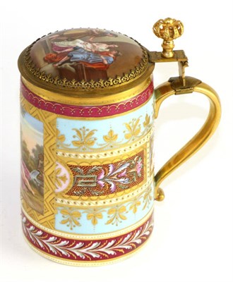 Lot 174 - A gilt metal mounted Vienna style porcelain tankard and cover, late 19th century, painted with...