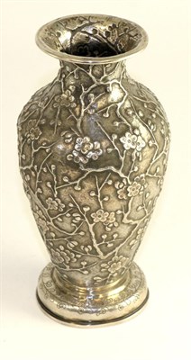 Lot 175 - A Chinese export silver baluster vase, circa 1900, repousse with flowering prunus, stamped MK...