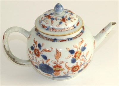 Lot 178 - A Chinese Imari teapot and cover, 18th century, globular form painted with foliage, 13cm high