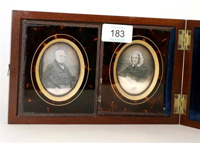 Lot 183 - Two photographic portraits in mahogany box, 21cm wide