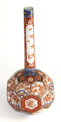 Lot 187 - Imari porcelain bottle vase, Meiji period, with panelled body, typically painted with foliage,...