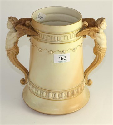 Lot 193 - A Royal Worcester porcelain twin handled vase, late 19th century, with caryatid handles, 23cm high