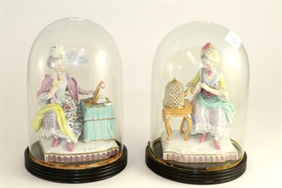 Lot 205 - A pair of Meissen porcelain figures of ladies, circa 1900, one sitting at a dressing table, the...