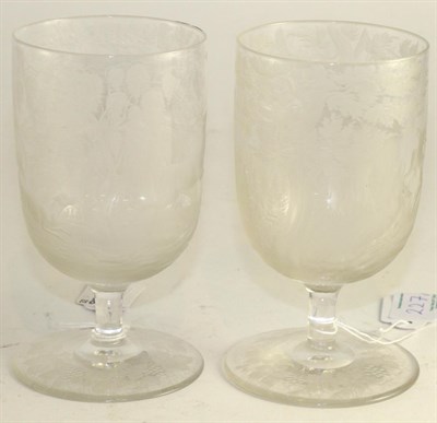 Lot 227 - A pair of Victorian wine glasses etched with stags in a wooded landscape, 14cm