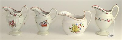 Lot 239 - A New Hall helmet shape cream jug, circa 1790, painted with a basket of flowers, 11.5cm high;...