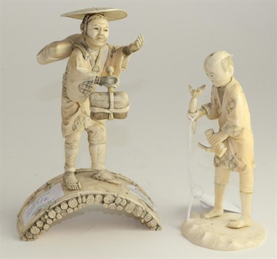 Lot 251 - A Japanese ivory okimono, Meiji period, of a traveller standing on a bridge, 17cm high; and another