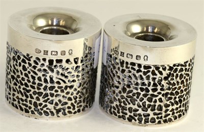 Lot 257 - Pair of silver candlesticks, by Derek Birch, 6cm high