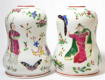 Lot 265 - A pair of French porcelain lamp shades, late 19th/early 20th century, painted in Chinese export...