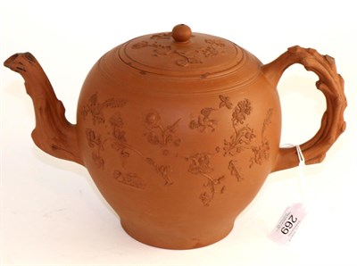 Lot 269 - A Staffordshire redware punch pot and cover, circa 1760, of ovoid form with crabstock spout and...
