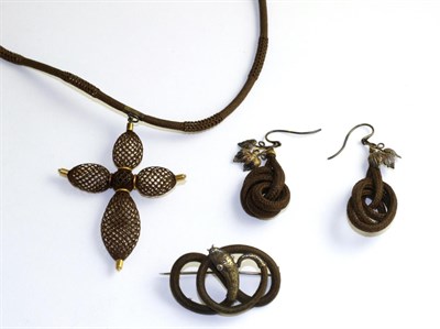 Lot 346 - Three items of Victorian hair jewellery, including; a Victorian hair necklace, a plaited hair cross