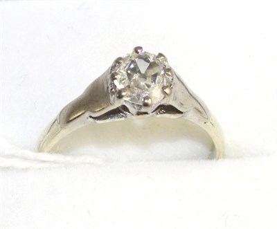 Lot 359 - A diamond solitaire ring, an old cut diamond in a white claw setting, to stepped shoulders on a...