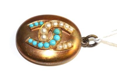 Lot 360 - A turquoise and split pearl set oval locket pendant, the front applied with two interlocked...