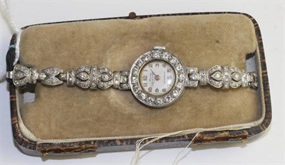 Lot 369 - A lady's diamond wristwatch, signed Mirca, circa 1950, lever movement, silvered dial with...