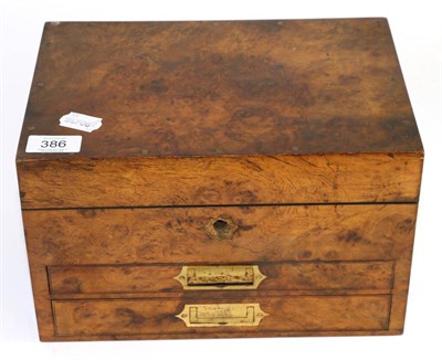 Lot 386 - # A Victorian burr walnut travelling games box with hinged cover and two drawers, 28.5cm wide, with