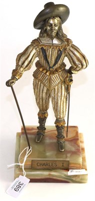 Lot 389 - A patinated bronze figure of Charles I on an onyx stand