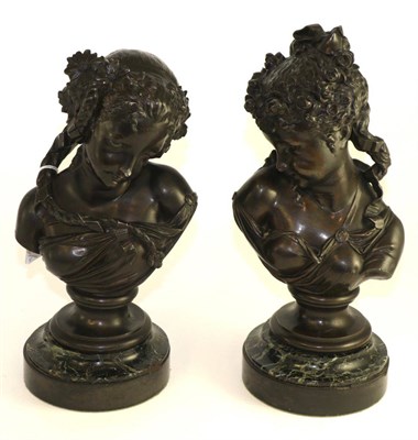 Lot 397 - After Albert Carrier-Belleuse, a pair of bronzed spelter busts of children on circles, 33cm high