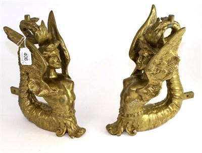 Lot 406 - A pair of brass mounts, 19th century, cast as winged figures, 27cm high